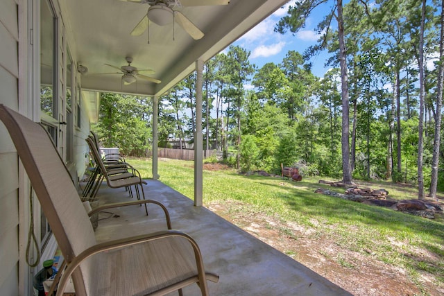 view of patio featuring ceiling fan