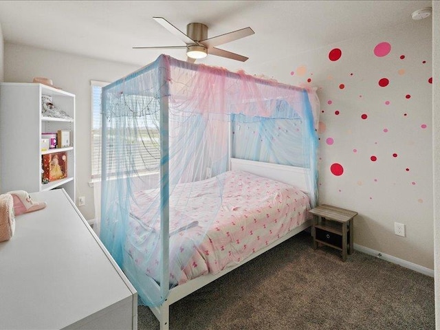 bedroom with ceiling fan, baseboards, and carpet