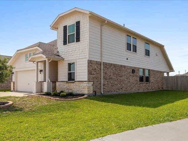 exterior space with a garage, fence, a front lawn, concrete driveway, and stone siding