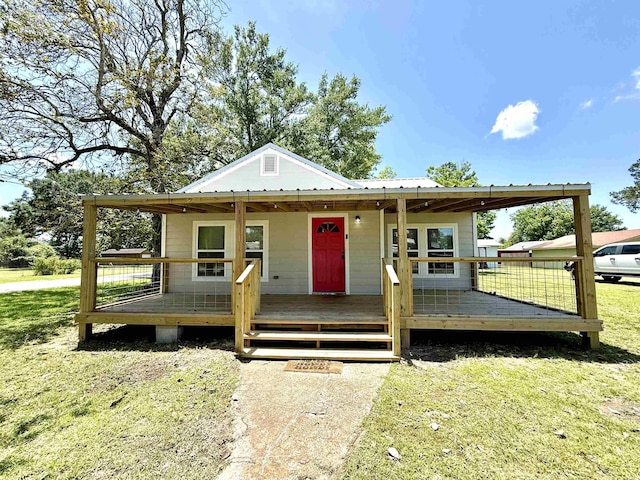 176 County Road 753, Buna, TX 77612 - view of front of home with a front lawn