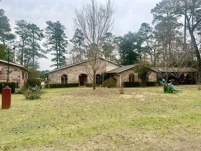 exterior space with a lawn