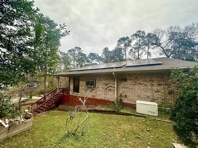 view of property exterior featuring a lawn