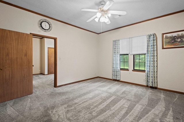 10425 Bussey Rd, Silsbee, TX 77656 - empty room with carpet floors, ceiling fan, ornamental molding, and vaulted ceiling
