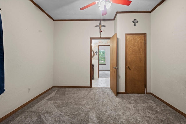 10425 Bussey Rd, Silsbee, TX 77656 - spare room with ornamental molding, a ceiling fan, and carpet flooring