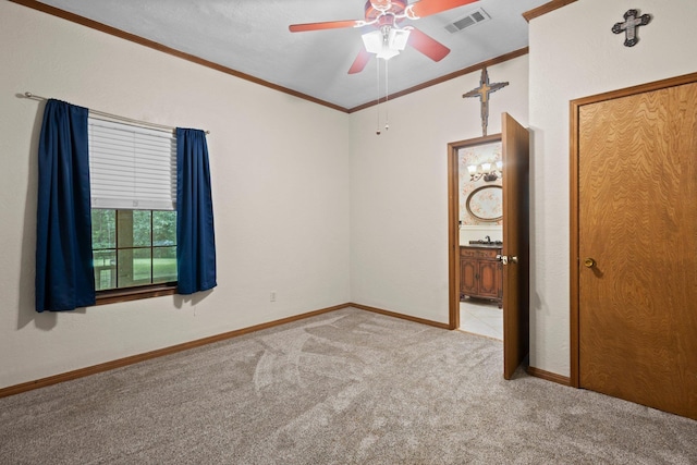 10425 Bussey Rd, Silsbee, TX 77656 - spare room with carpet flooring, ornamental molding, ceiling fan, and lofted ceiling