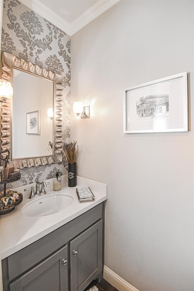 131 Oakdale, Silsbee, TX 77656 - bathroom featuring crown molding, baseboards, and vanity