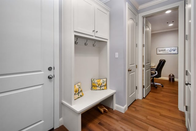 131 Oakdale, Silsbee, TX 77656 - mudroom with recessed lighting, baseboards, ornamental molding, and light wood-type flooring