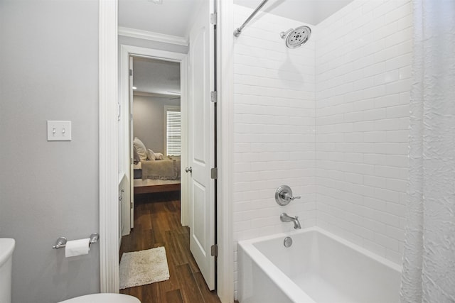 131 Oakdale, Silsbee, TX 77656 - full bathroom featuring crown molding, shower / bath combo, toilet, and wood finished floors