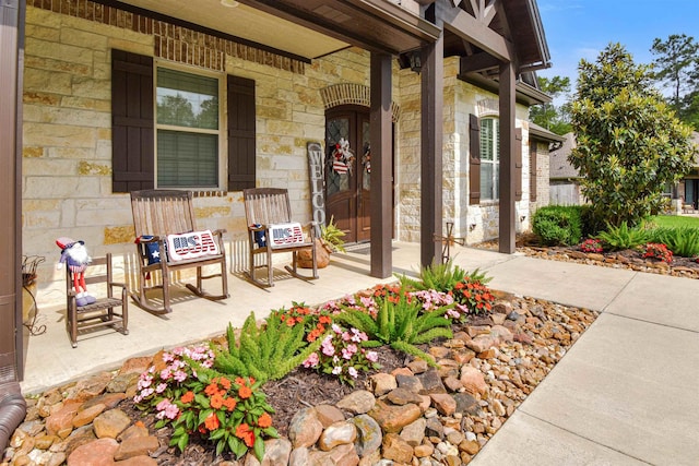 131 Oakdale, Silsbee, TX 77656 - entrance to property featuring a porch and stone siding