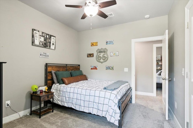 carpeted bedroom with ceiling fan