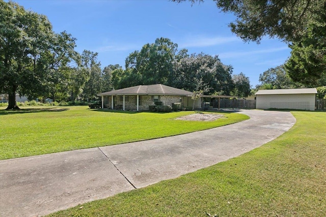 ranch-style home with a front yard