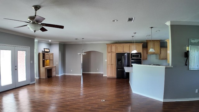 kitchen with dark hardwood / wood-style floors, hanging light fixtures, ornamental molding, and black appliances