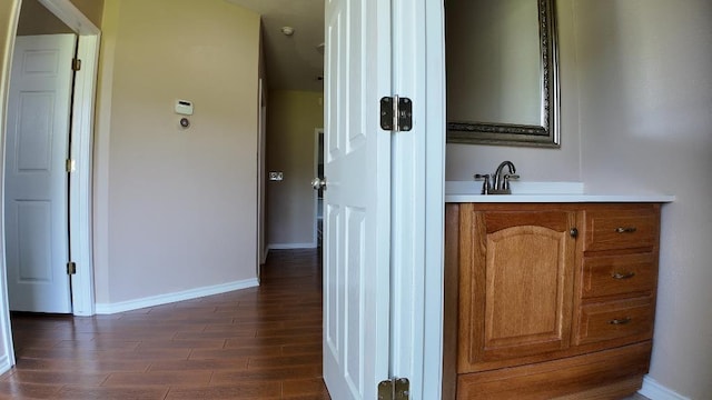 bathroom featuring hardwood / wood-style floors and vanity