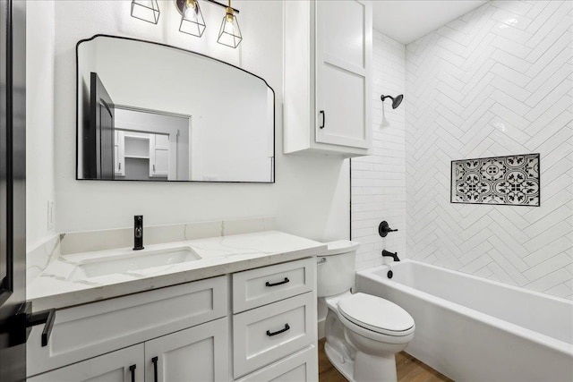 full bathroom with toilet, vanity, shower / bathing tub combination, and wood finished floors