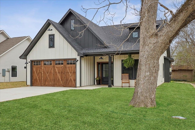 modern farmhouse style home featuring board and batten siding, concrete driveway, a front yard, and roof with shingles