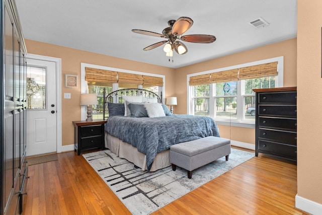 bedroom featuring ceiling fan and hardwood / wood-style flooring