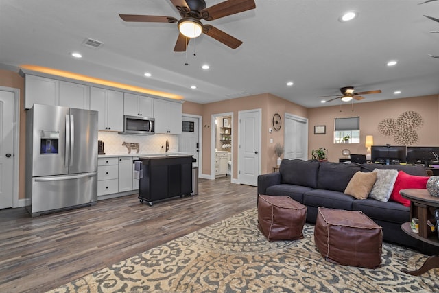 living room with dark wood-type flooring