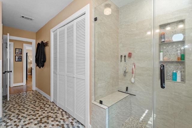 bathroom featuring walk in shower