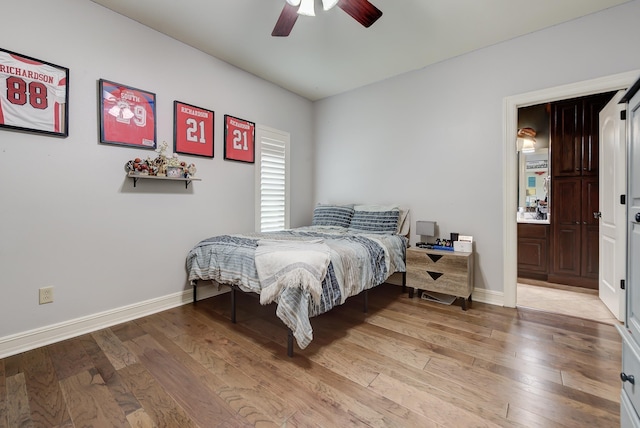 bedroom featuring ceiling fan and light hardwood / wood-style floors