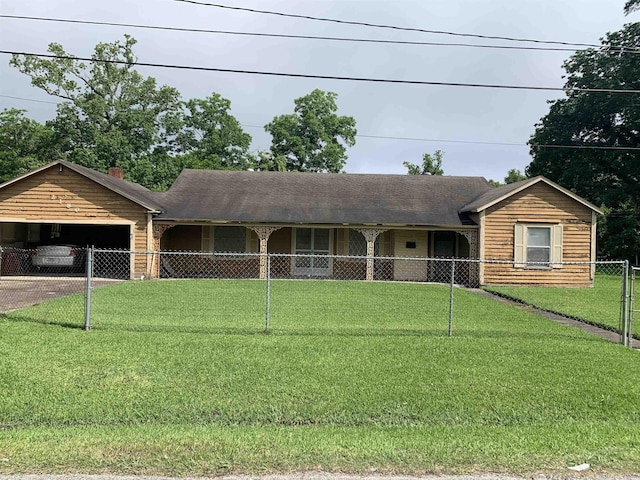 2180 Tyler St, Beaumont, TX 77703 - ranch-style house featuring concrete driveway, an attached garage, and a chimney