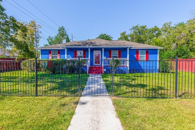 bungalow with a porch and a front yard