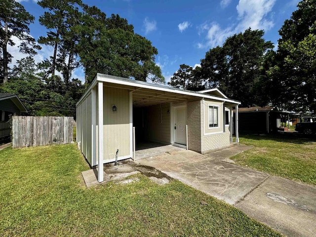 3025 19th St, Beaumont, TX 77706 - view of outdoor structure featuring driveway
