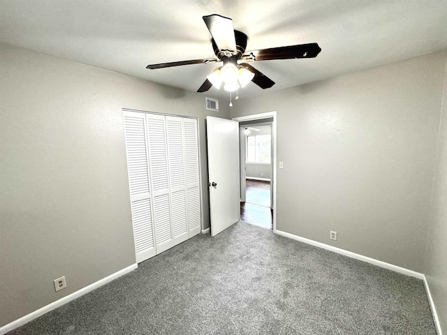3025 19th St, Beaumont, TX 77706 - unfurnished bedroom with carpet flooring, baseboards, a closet, and ceiling fan
