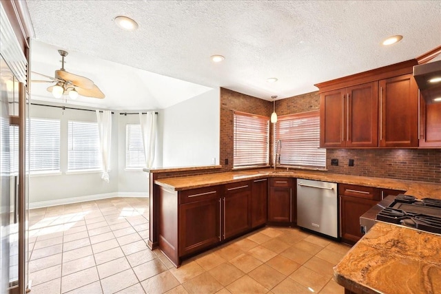 kitchen with light tile patterned flooring, pendant lighting, dishwasher, ceiling fan, and kitchen peninsula