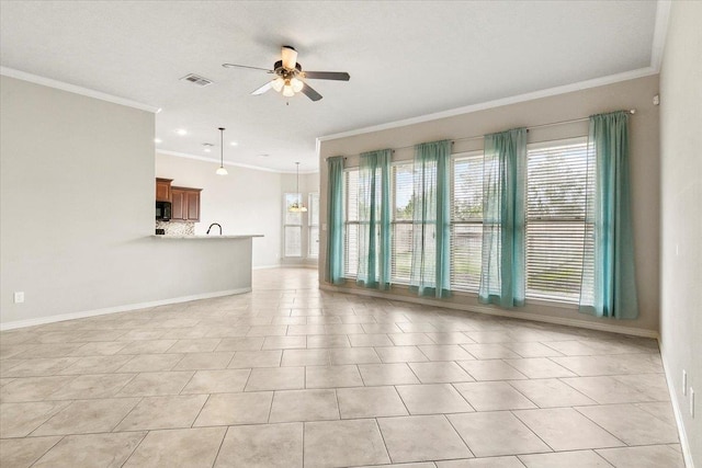 unfurnished living room featuring ceiling fan, light tile patterned floors, and ornamental molding