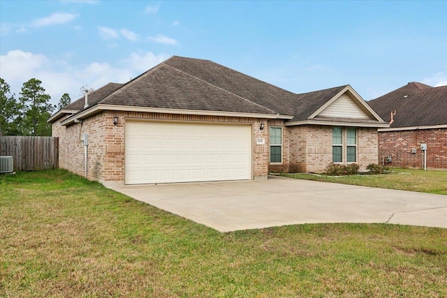 single story home featuring a front yard, a garage, and central air condition unit