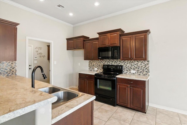 kitchen with black appliances, decorative backsplash, light tile patterned floors, and sink