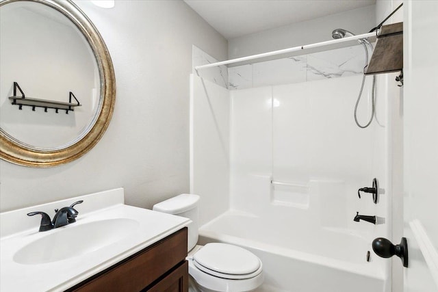 full bathroom featuring vanity, toilet, and bathtub / shower combination