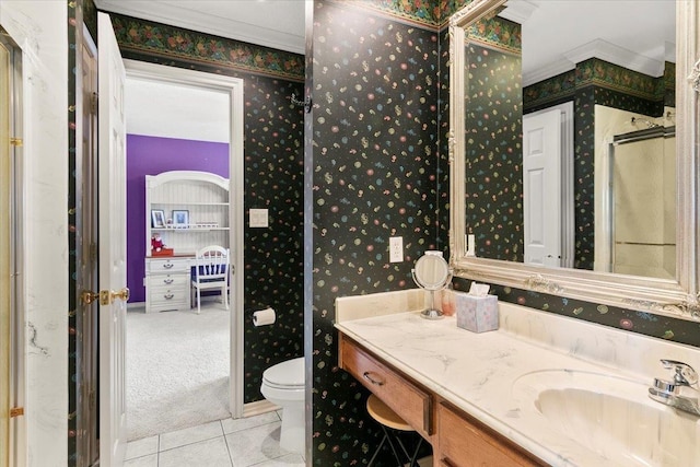 bathroom featuring tile patterned floors, a shower, toilet, and ornamental molding