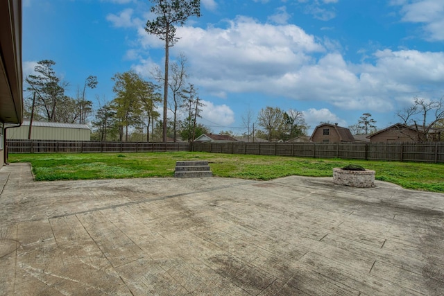view of patio / terrace featuring a fire pit
