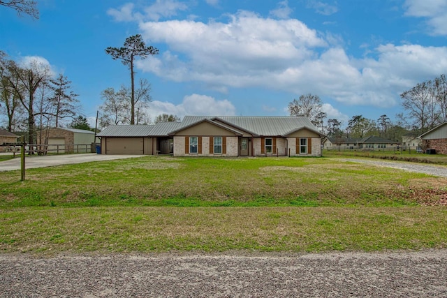 ranch-style house featuring a garage