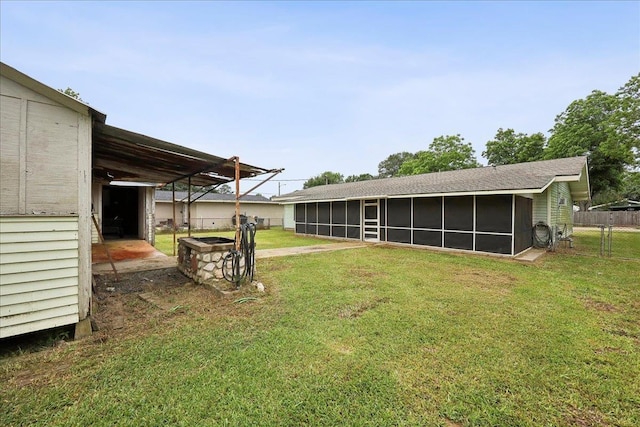 275 E Clover Ln, Bridge City, TX 77611 - view of yard featuring a sunroom