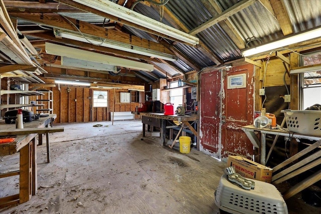 275 E Clover Ln, Bridge City, TX 77611 - miscellaneous room with a workshop area and vaulted ceiling