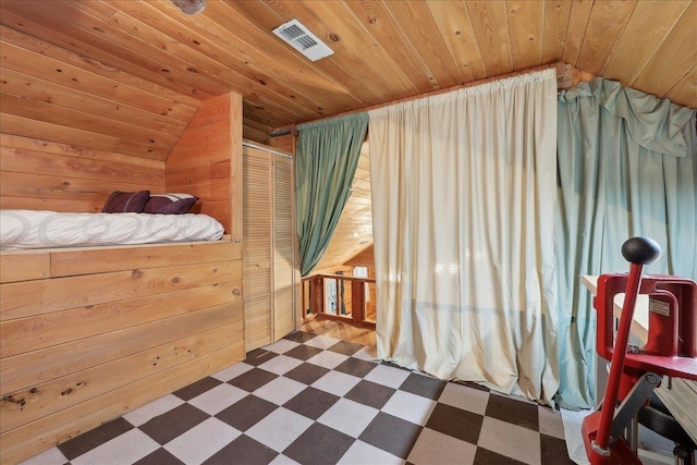 9570 Skeeter Dr, Orange, TX 77632 - bedroom featuring dark flooring, lofted ceiling, wood walls, and wood ceiling