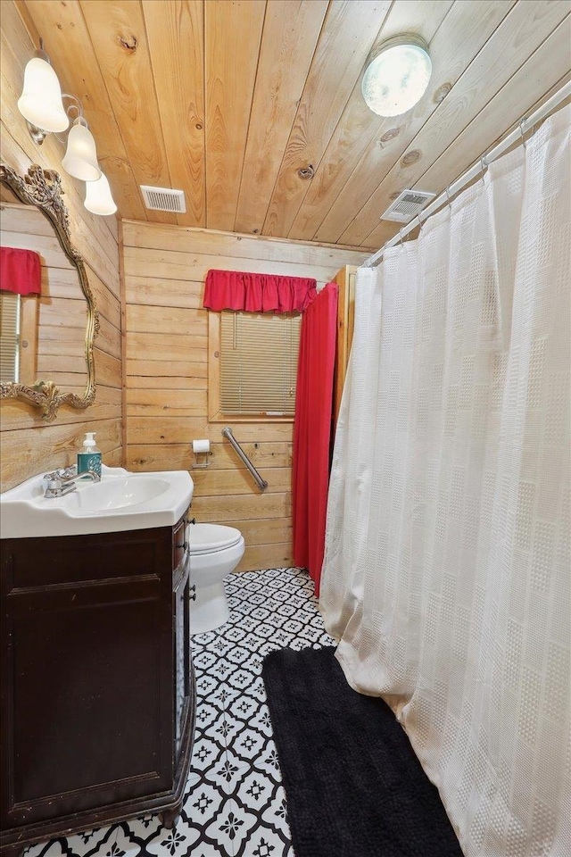 9570 Skeeter Dr, Orange, TX 77632 - bathroom featuring wood ceiling, wood walls, toilet, vanity, and curtained shower