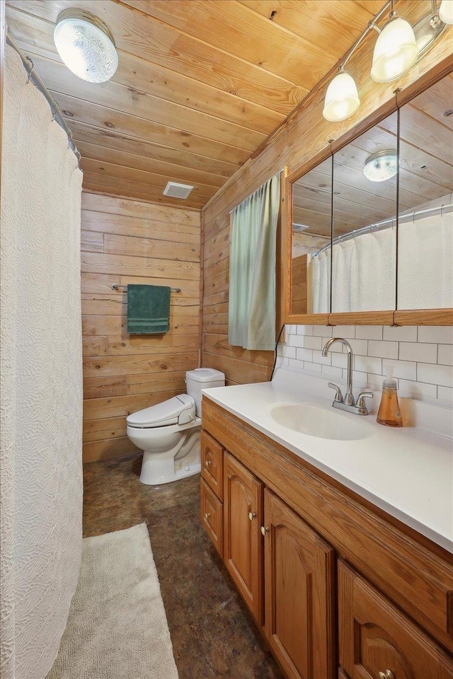 9570 Skeeter Dr, Orange, TX 77632 - full bath with wooden ceiling, tasteful backsplash, toilet, vanity, and wooden walls