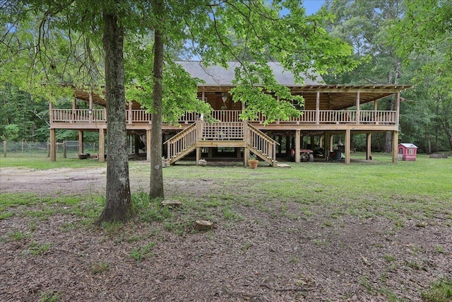 9570 Skeeter Dr, Orange, TX 77632 - back of house with stairway, a wooden deck, and log exterior