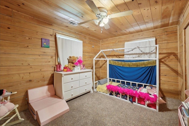 9570 Skeeter Dr, Orange, TX 77632 - bedroom featuring wooden ceiling, wooden walls, and carpet flooring