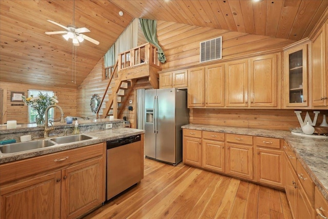 9570 Skeeter Dr, Orange, TX 77632 - kitchen featuring stainless steel appliances, a sink, wooden ceiling, light wood finished floors, and high vaulted ceiling
