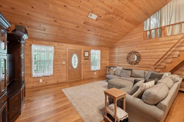 9570 Skeeter Dr, Orange, TX 77632 - living area with high vaulted ceiling, plenty of natural light, light wood-style floors, wood ceiling, and wood walls
