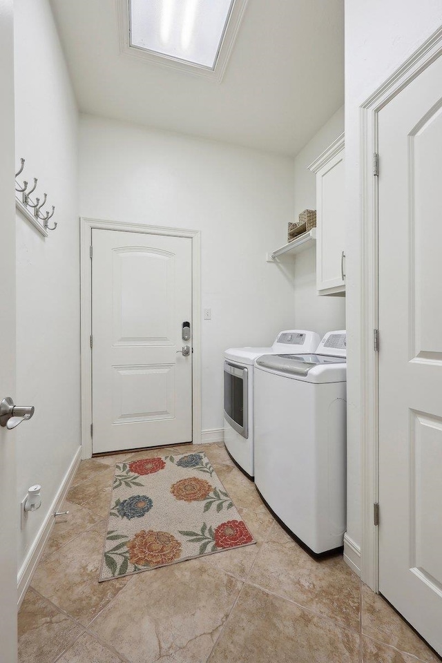 640 Winchester Dr, Bridge City, TX 77611 - laundry room featuring independent washer and dryer, cabinet space, light tile patterned floors, and baseboards