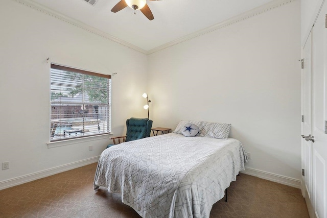 640 Winchester Dr, Bridge City, TX 77611 - carpeted bedroom featuring baseboards, ornamental molding, and ceiling fan