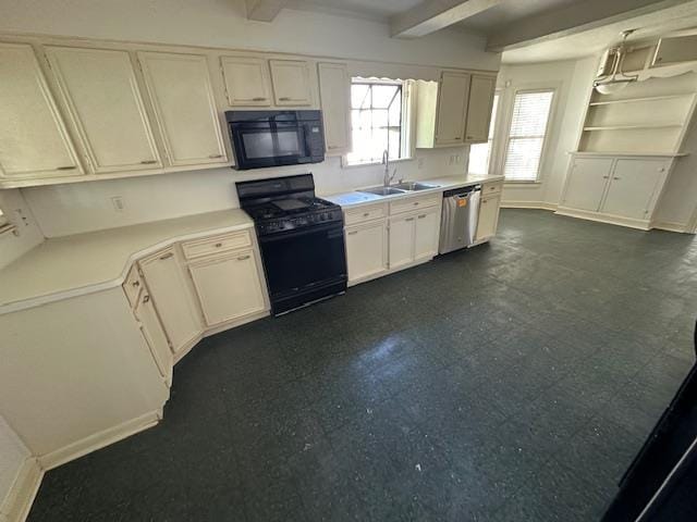 kitchen with black appliances, beam ceiling, white cabinetry, and sink