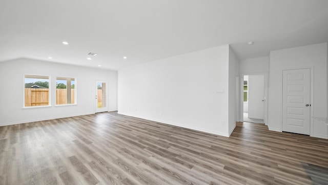 unfurnished living room with light hardwood / wood-style flooring