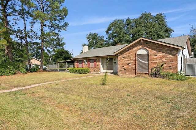 single story home with central AC and a front lawn