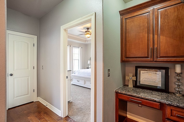 hallway featuring dark hardwood / wood-style floors